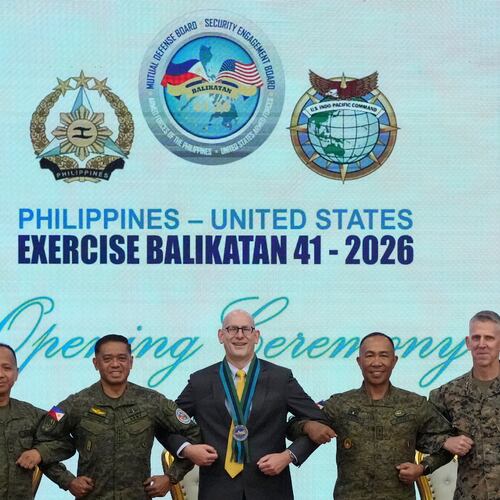 From left, Major General Francisco Lorenzo Jr., Philippine exercise director, Philippine military Chief General Romeo Brawner, U.S. Charge d' Affaires, Ad interim Y. Robert Ewing, Philippine Deputy Chief of Staff for Operations J3 Major General Elmer Suderio and US Lieutenant General Christian Wortman, Commanding General I Marine Expeditionary Force, pose during the opening ceremonies of the joint military exercise dubbed "Balikatan" or "Shoulder to Shoulder", Monday, April 20, 2026, at Camp Aguinaldo military headquarters in Quezon city, Philippines. (AP Photo/Aaron Favila)