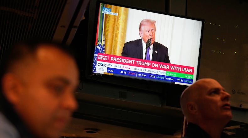 A television carries a speech by President Donald Trump on the floor at the New York Stock Exchange in New York, Monday, March 2, 2026. (AP Photo/Seth Wenig)