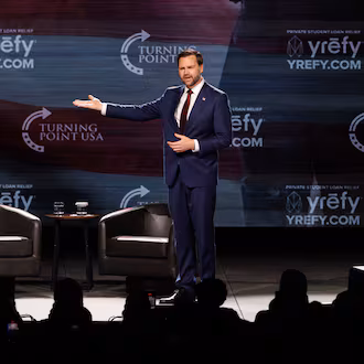 Vice President JD Vance enters a Turning Point USA event at Akins Ford Arena in Athens on April 14, 2026. (Arvin Temkar/AJC)