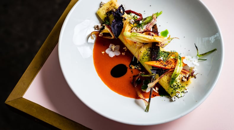 The Bechamel Comte Crepe with Sorghum Vinaigrette and Pistachio Oil at Tiny Lou’s is from chef Jeb Aldrich. He has an appreciation for classic sauces such as bechamel.