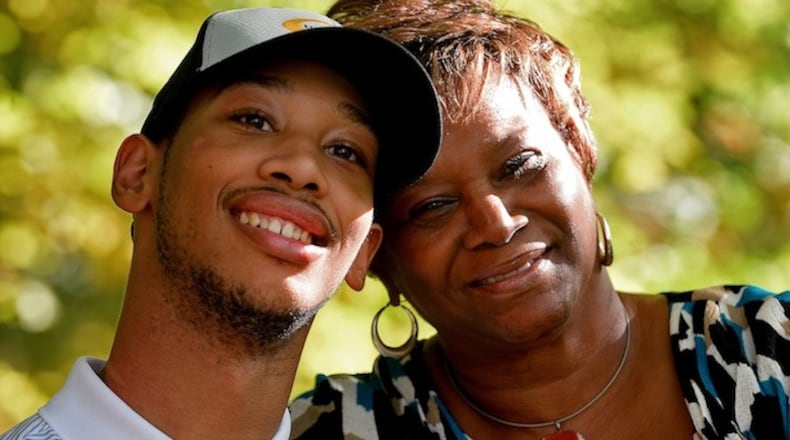Chancellor Lee Adams, left, and his grandmother and Saundra Adams at Freedom Park in Charlotte in early November. Chancellor was never supposed to live for even a day -- his father, former Carolina Panther Rae Carruth, was convicted of masterminding a conspiracy to murder him and his mother, Cherica Adams, so Carruth would not have to pay child support. Chancellor Lee turns 18 on Nov. 16th, 2017. (Jeff Siner/Charlotte Observer/TNS)