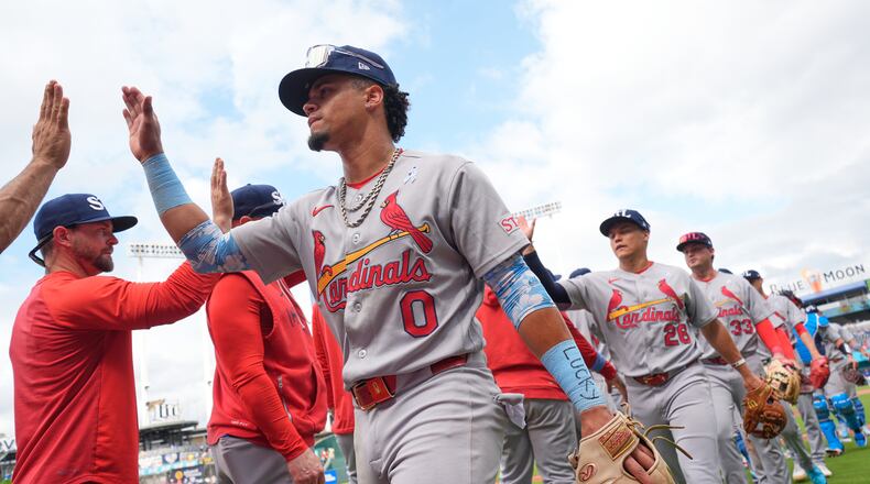 St. Louis Cardinals' Masyn Winn (0) celebrates with teammates afte a baseball game against the Kansas City Royals, Sunday, June 21, 2026, in Kansas City, Mo. (AP Photo/Charlie Riedel)