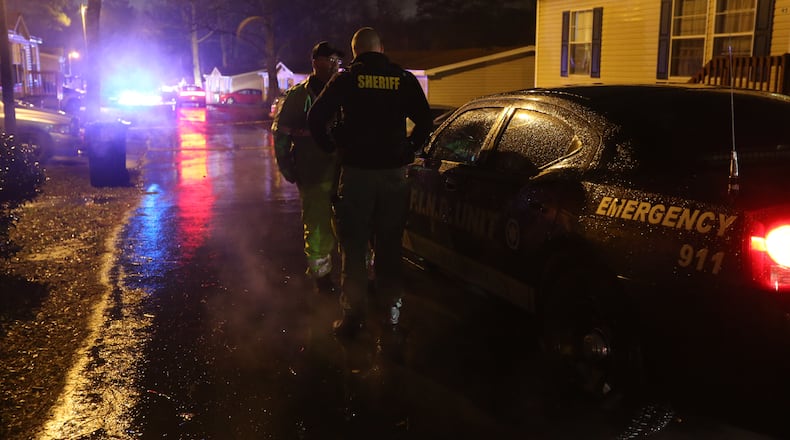 Authorities were investigating after a man was fatally shot by a Douglas County deputy on Monday, Dec. 21, 2015. (Ben Gray / bgray@ajc.com)