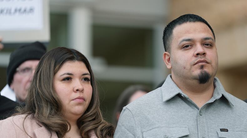Kilmar Abrego Garcia and his wife Jennifer Vasquez Sura leave the United States District Court District of Maryland, Monday, Dec. 22, 2025, in Greenbelt, Md. (AP Photo/Stephanie Scarbrough)
