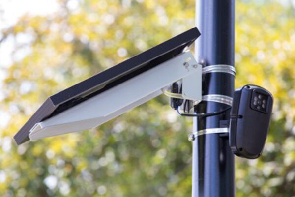 A Flock Safety camera is able to gather information such as license plates for anyone who drives nearby. (Casey Sykes/AJC file photo)