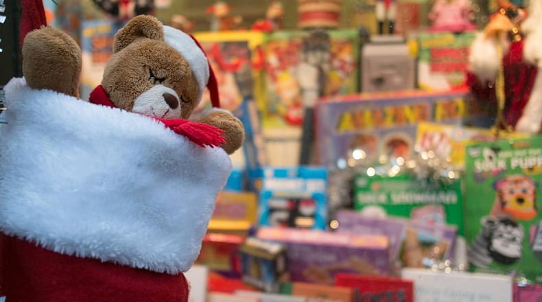 Andrea Reed hopes to return the Christmas presents she found on an interstate highway to the boy they were intended for.