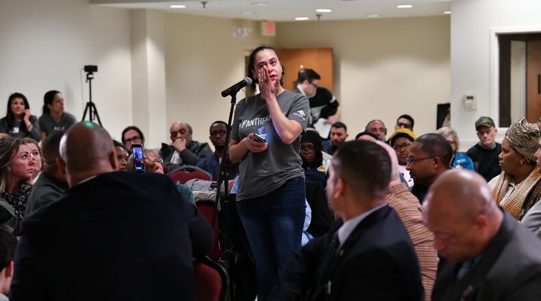 Ivy Treadwell-Garcia speaks during Tuesday's town hall meeting hosted by the ACLU of Georgia and other organizations about the conditions at the Cobb County jail.