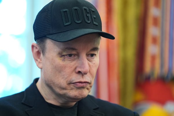Elon Musk attends a news conference with President Donald Trump in the Oval Office of the White House, Friday, May 30, 2025, in Washington. (AP Photo/Evan Vucci)