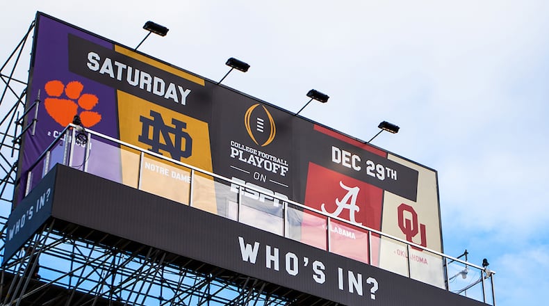 ESPN's billboard in San Jose, Calif., will be home to four rabid college football fans for 12 days.