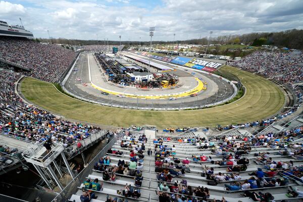 Drivers race around the track during a NASCAR Cup Series auto race in Martinsville, Va., Sunday, March 30, 2025. (AP Photo/Chuck Burton)