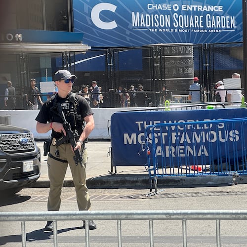 A Secret Service agent stands watch outside Madison Square Garden in New York, Monday, June 8, 2026, as President Donald Trump is set to attend Game 3 of the NBA Finals basketball series between the New York Knicks and the San Antonio Spurs. (AP Photo/Ted Shaffrey)