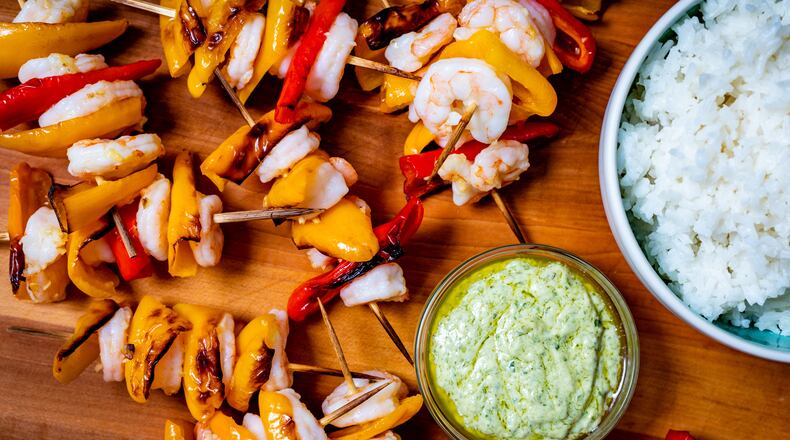 Shrimp and Pepper Skewers with Creamy Pesto Dipping Sauce. Henri Hollis for The Atlanta Journal-Constitution