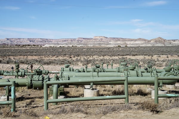 A view of natural gas pipes installed above ground in a field at a well pad in Counselor, N.M., Navajo Nation, on Tuesday March 11, 2025. (Nadav Soroker/Searchlight New Mexico via AP)