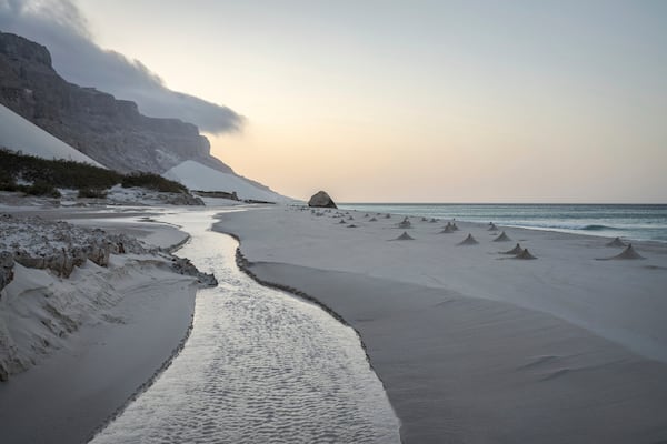 Ghost crab nests line the beach on the Yemeni island of Socotra on Sept. 22, 2024. (AP Photo/Annika Hammerschlag)