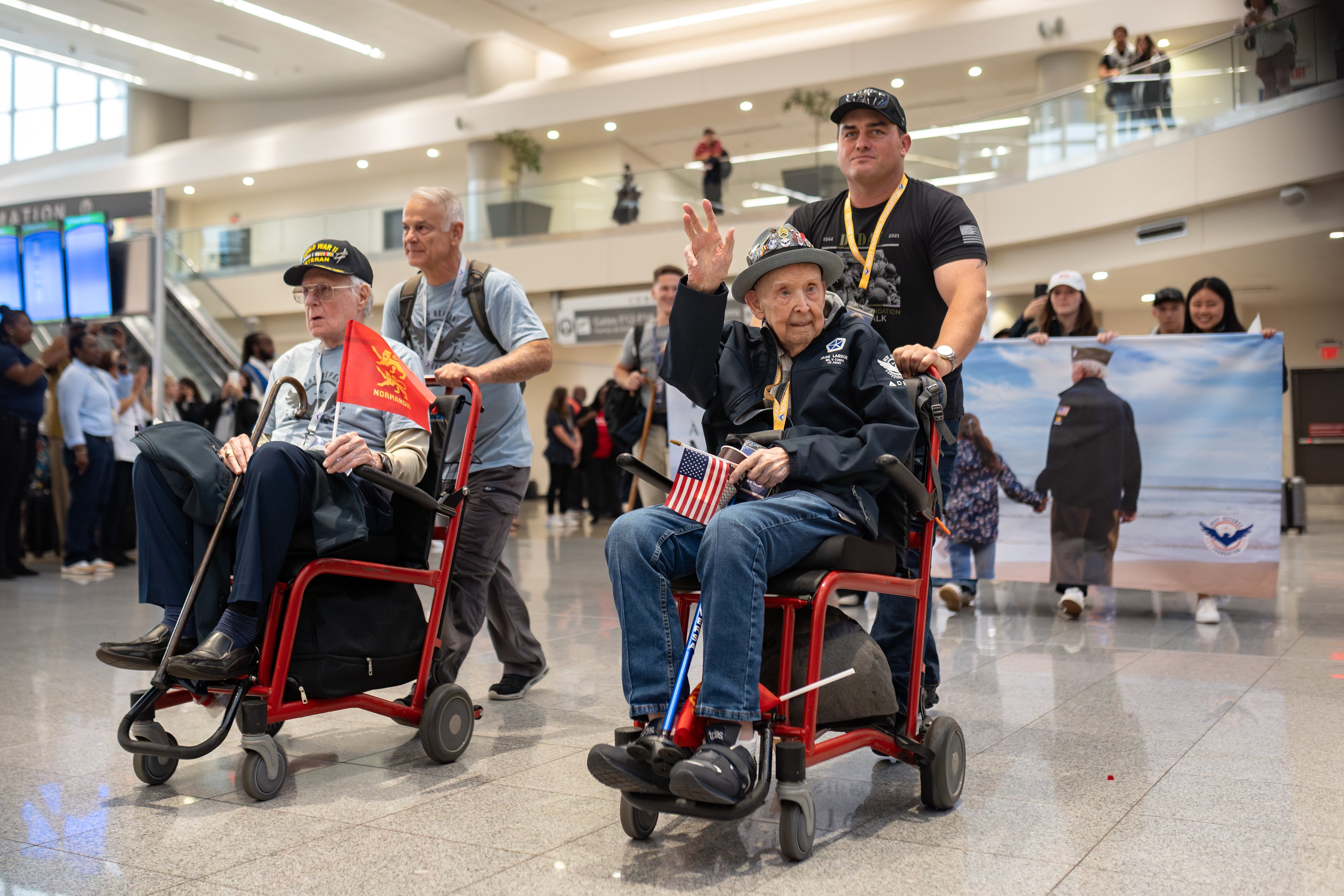 World War Two veterans arrive at Hartsfield-Jackson International airport for the Normandy Legacy Flight to Normandy, France on the 81st anniversary of the D-Day invasion. Saturday, May 31, 2025 (Ben Hendren for the Atlanta Journal-Constitution)