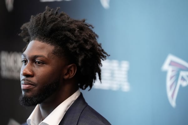 Atlanta Falcons first-round draft pick Jalon Walker speaks during a news conference, Friday, April 25, 2025, in Flowery Branch, Ga. (AP Photo/Brynn Anderson,)