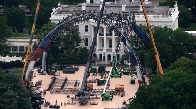 Equipment being placed on the South Lawn of the White House is seen from the Washington Monument, Tuesday, May 26, 2026, in Washington. The UFC is holding a mixed martial arts fight on June 14 as part of America 250 celebrations. (AP Photo/Mark Schiefelbein)