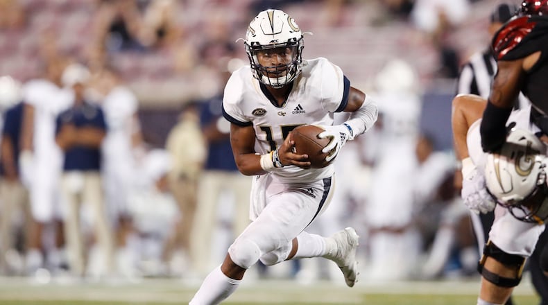 Georgia Tech quarterback TaQuon Marshall runs, and runs, and runs, against Louisville . (Joe Robbins/Getty Images)