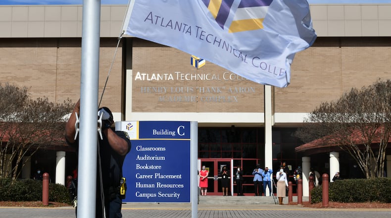 Atlanta Technical College lowered flags to half-staff to honor Hank Aaron earlier this year. Georgia manages leases on classroom buildings for technical colleges. (Hyosub Shin / Hyosub.Shin@ajc.com)