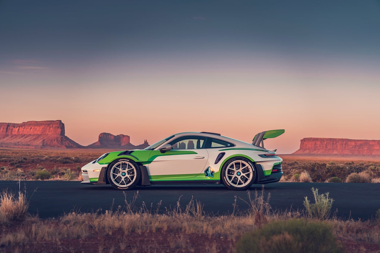 The Buzz Lightyear-inspired 911 GT3 RS features a white, green and purple
color scheme, a rear wing echoing the character's signature “wings" and custom
“Lightyear” tires. (Courtesy of Porsche Cars North America)