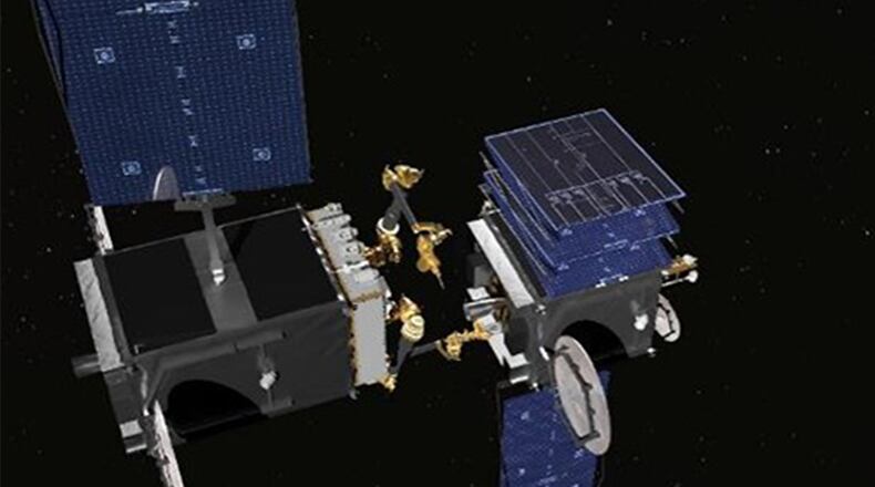 This artist’s rendering shows the robotic arms that are being built for DARPA’s RSGS program. The robotic servicer, on the left, is preparing to use a tool to open a stuck solar array on a disabled satellite. (SSL)