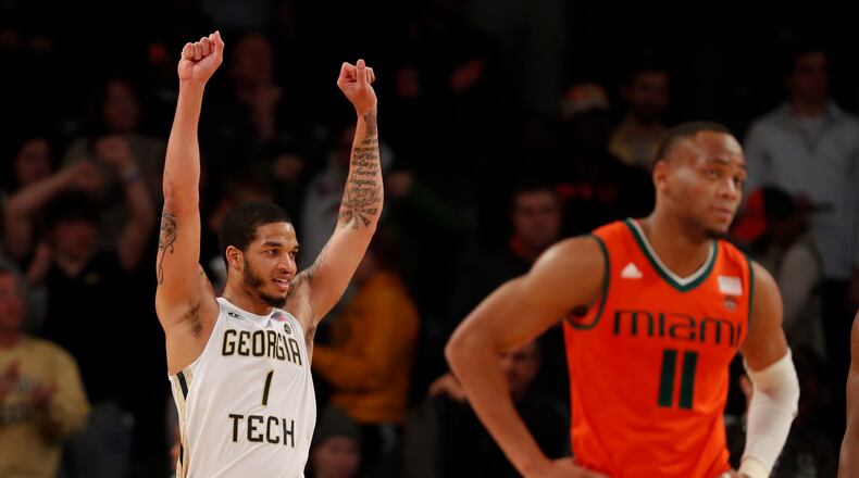 Georgia Tech guard Tadric Jackson (1) reacts as Miami guard Bruce Brown Jr. (11) walks away in the second half of an NCAA college basketball game Wednesday, Jan. 3, 2018, in Atlanta. Georgia Tech won 64-54. (AP Photo/John Bazemore)