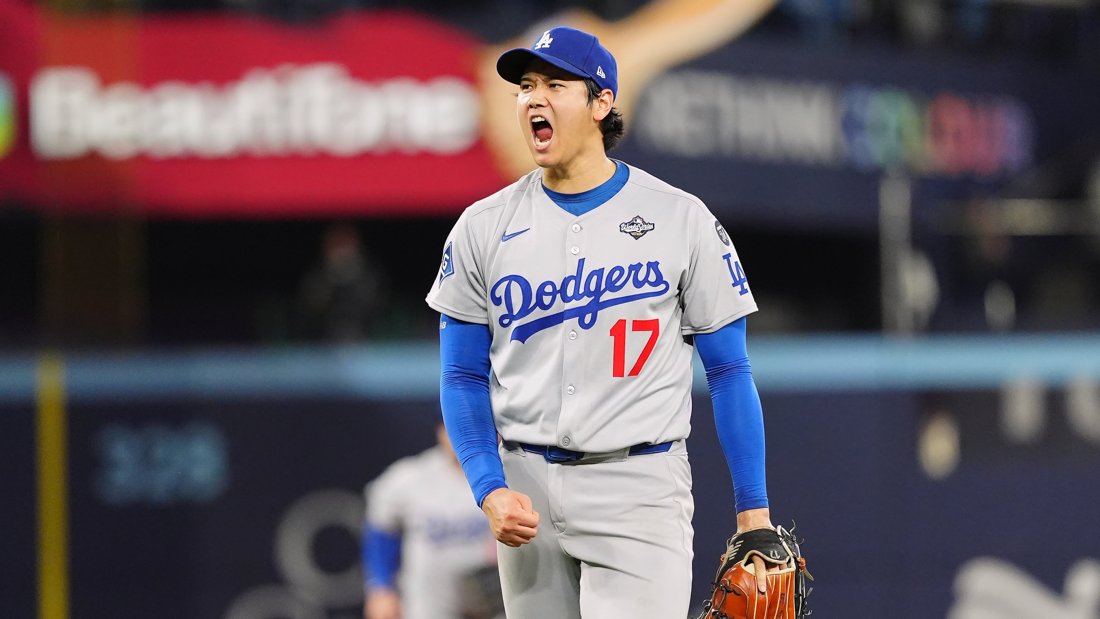 Los Angeles Dodgers pitcher Shohei Ohtani (17) celebrates after striking out Toronto Blue Jays' Andrés Giménez with the bases loaded to end the second inning in Game 7 of baseball's World Series in Toronto on Saturday, Nov. 1, 2025. (Frank Gunn/The Canadian Press via AP)