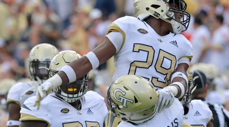 September 29, 2018 Atlanta - Georgia Tech defensive back Tariq Carpenter (29) celebrates with Georgia Tech defensive lineman Antwan Owens (89) after Owens recovered a fumble in the second half at Bobby Dodd Stadium on Saturday, September 29, 2018.  Georgia Tech won 63-17 over the Bowling Green. HYOSUB SHIN / HSHIN@AJC.COM