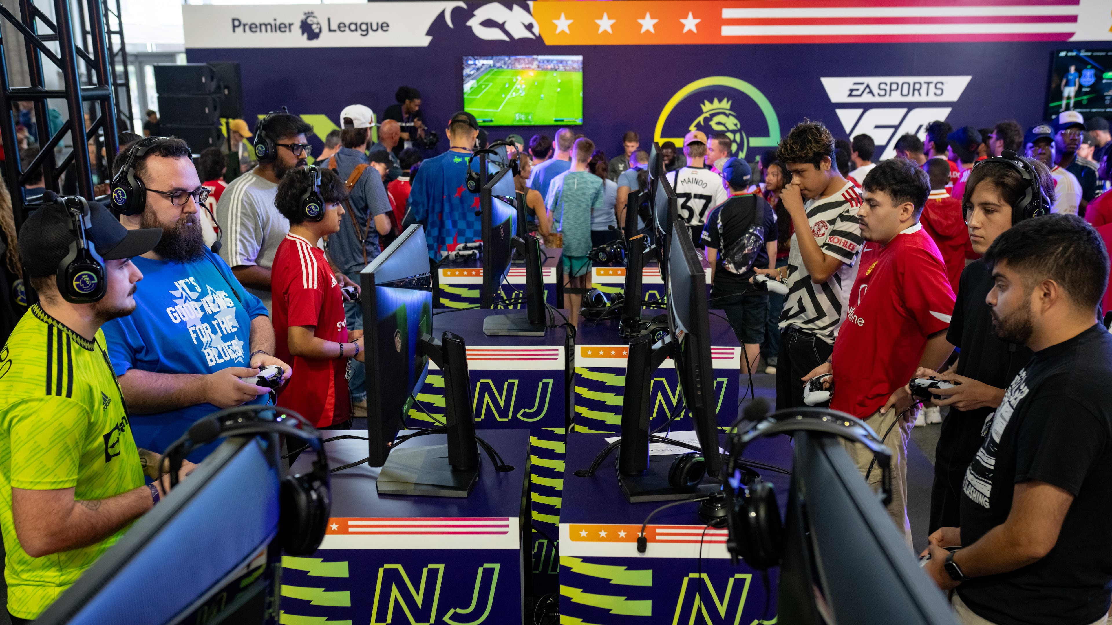 Roughly two dozen monitors and Xboxes or Playstations were culstered on the main concourse at Mercedes-Benz Stadium for competing in EA Sports FC at ePremier Fan Festival on Saturday, Aug. 2, 2025. (Ben Hendren for the AJC)