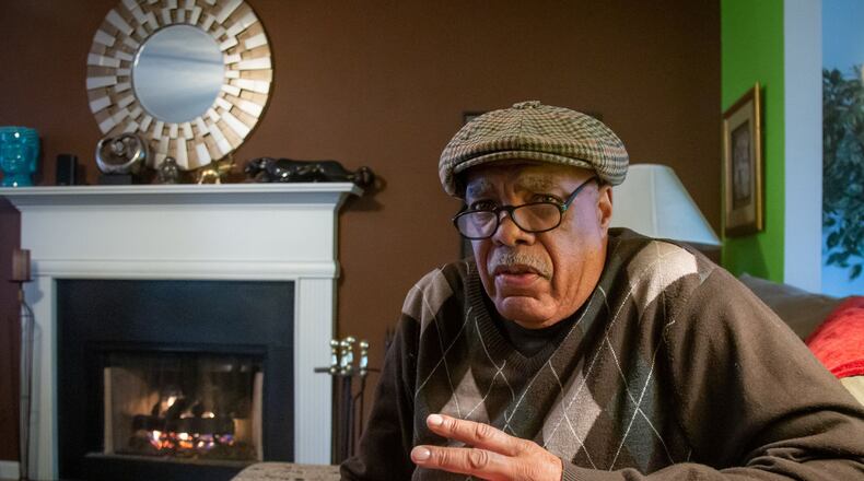 Donell Peterman talks about voter registration issues in his Union City home. STEVE SCHAEFER / SPECIAL TO THE AJC