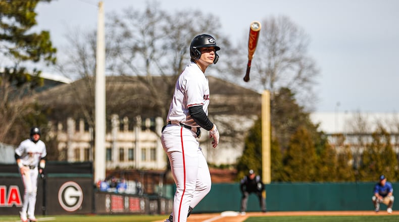 Georgia infielder Slate Alford (44) flips his bat on Sunday after hitting his third of three home runs in a three-game series against UNC-Asheville Georgia’s game against UNC Asheville at Foley Field. (Photo by Kari Hodges/UGA Athletics)