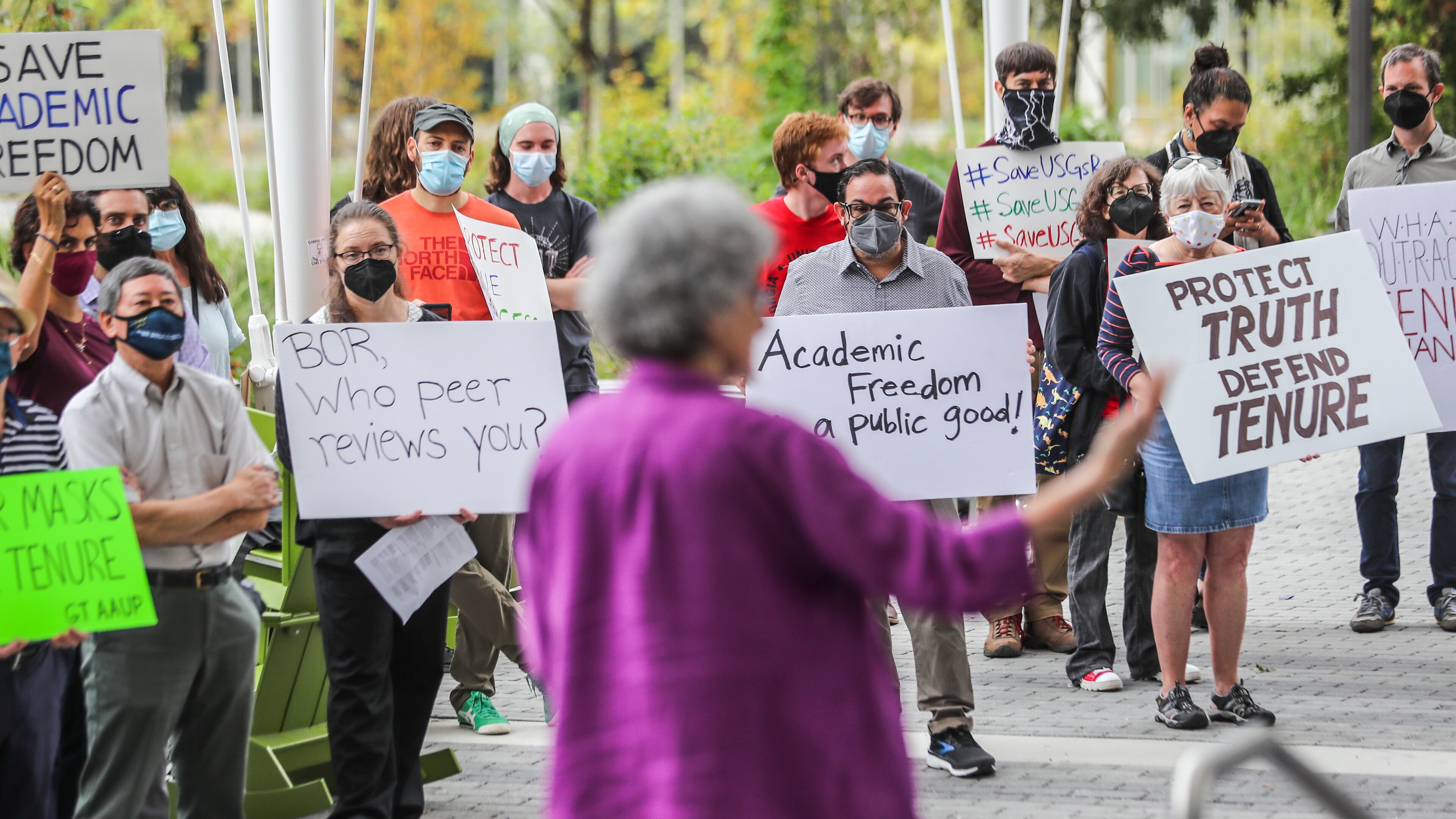 Professors from several public colleges and universities in Georgia gathered on Georgia Tech's campus in October 2021 against changes to the University System of Georgia’s post-tenure review process. Their concerns included that the changes would limit academic freedom for faculty members. (File)