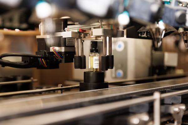 A custom scent is bottled at Indiehouse Modern Fragrances. (Estela Muñoz/AJC)