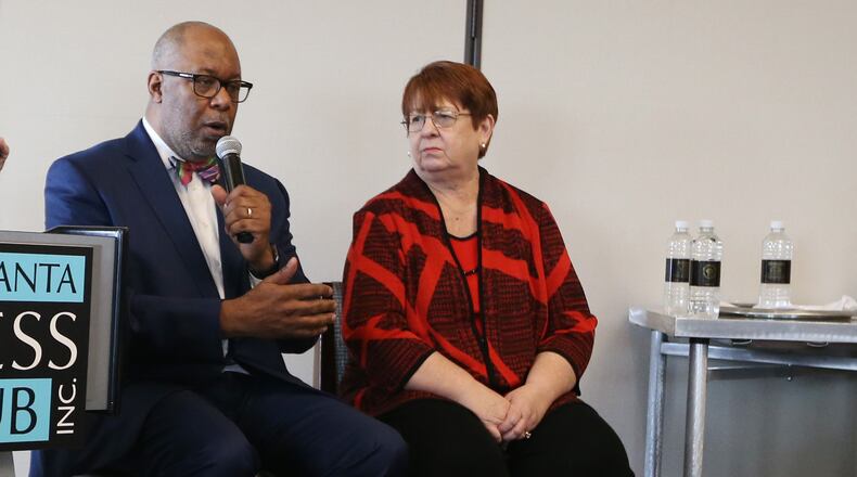 Doug Hooker, executive director, Atlanta Regional Commission, and Gwinnett County Commission Chairwoman Charlotte Nash answer questions at the Atlanta Press Club Monday. EMILY HANEY / emily.haney@ajc.com