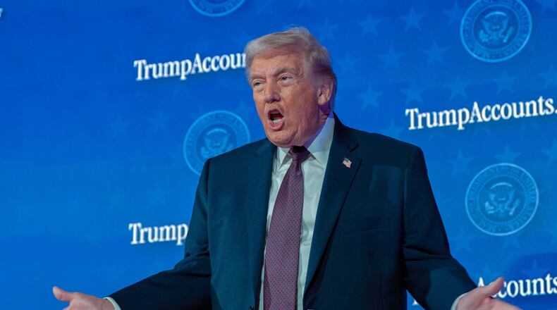President Donald Trump gestures during the launch of a program known as Trump Accounts at the Andrew W. Mellon Auditorium, Wednesday, Jan. 28, 2026, in Washington. (AP Photo/Jose Luis Magana)