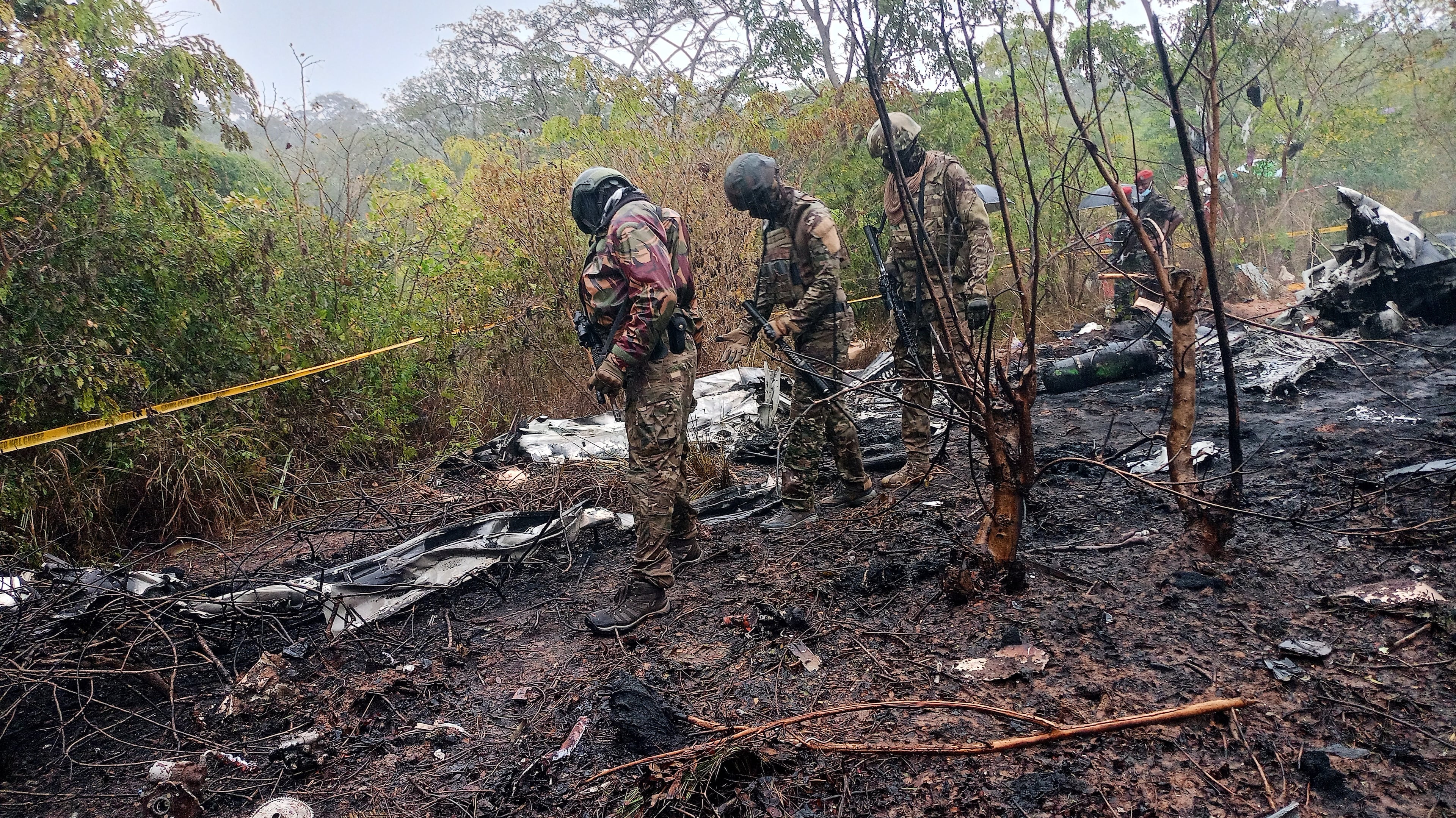 Kenyan officials inspect the scene of a plane crash near Diani, Kenya, Tuesday, Oct. 28, 2025. (AP Photo)