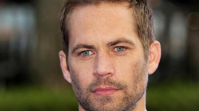 Actor Paul Walker attends the World Premiere of 'Fast & Furious 6' at Empire Leicester Square on May 7, 2013 in London, England.  (Photo by Tim P. Whitby/Getty Images)