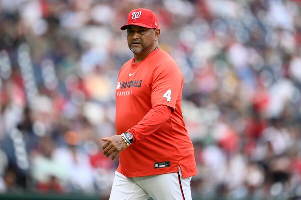 Washington Nationals manager Dave Martinez walks back to the dugout after a pitching change during the eighth inning of a baseball game against the Boston Red Sox, Sunday, July 6, 2025, in Washington. (AP Photo/Nick Wass)