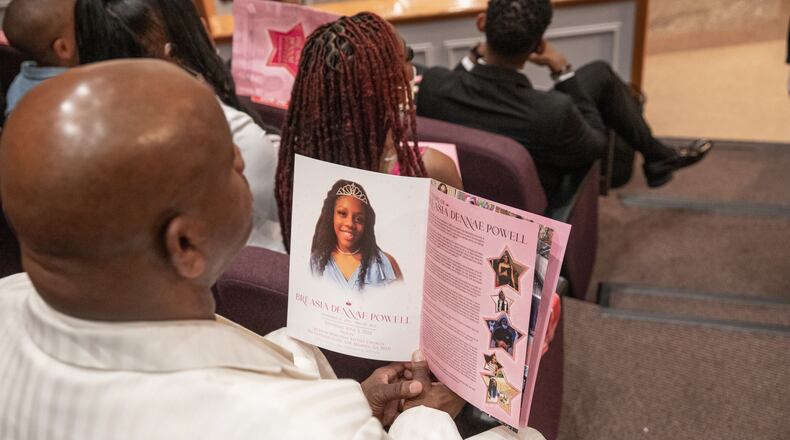 A third teenager was arrested Tuesday in the killing of Bre’Asia Powell, police said. Powell, whose photo is shown in a program for her funeral, was shot May 28 during an unauthorized gathering at Benjamin E. Mays High School.