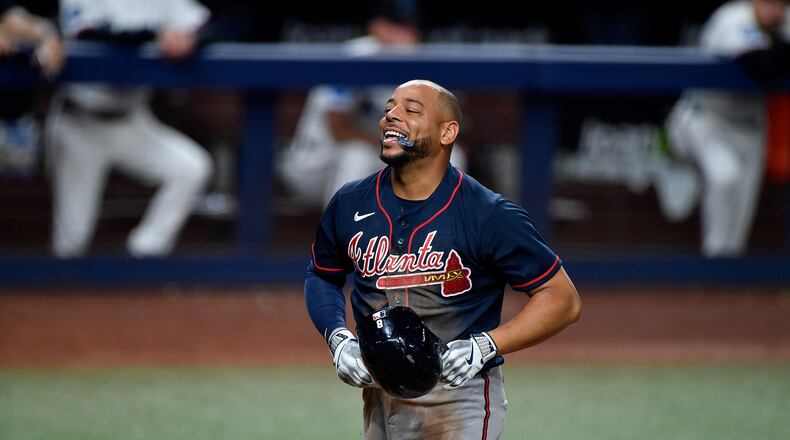 Braves designated hitter Dominic Smith reacts to scoring a run during the eighth inning against the Marlins on Wednesday, May 20, 2026, in Miami. (Michael Laughlin/AP)