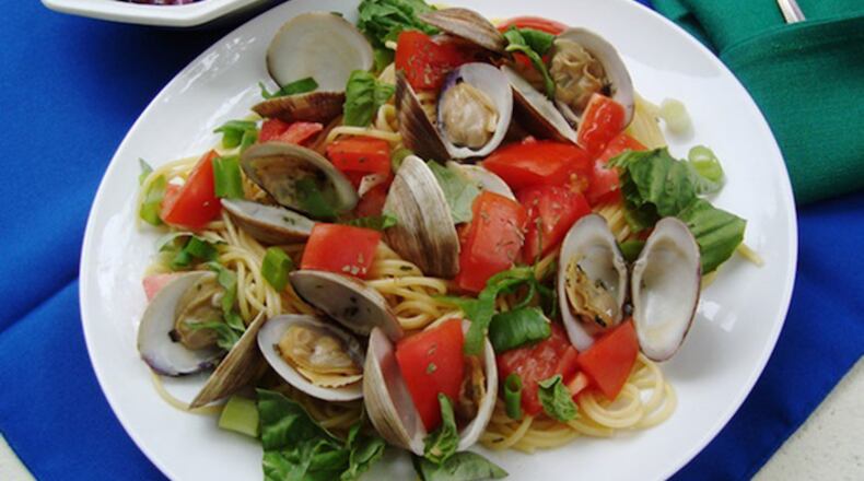 Spaghettini with clams and herb sauce. (Linda Gassenheimer/TNS)