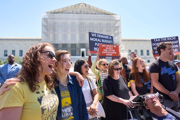 Activists with the Poor People's Campaign protest against spending reductions across Medicaid, food stamps and federal aid in President Donald Trump's spending and tax bill being worked on by Senate Republicans this week, outside the Supreme Court in Washington, Monday, June 2, 2025. (AP Photo/J. Scott Applewhite)