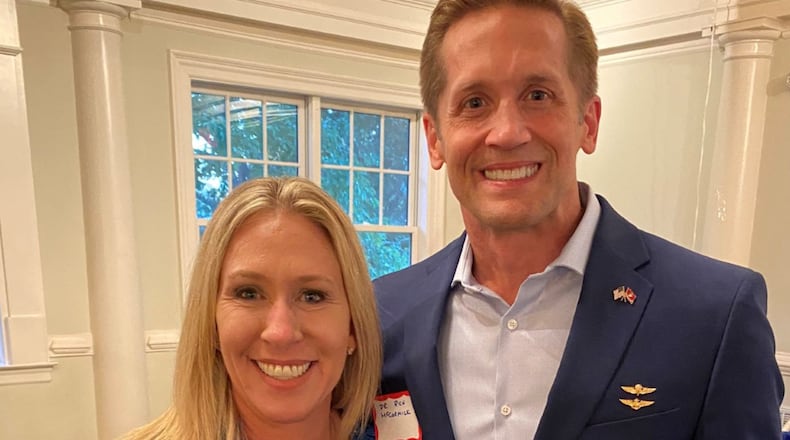 Marjorie Taylor Greene, the Republican candidate in Georgia's 14th Congressional District, posted this picture on Twitter along with her endorsement of 7th District candidate Rich McCormick. The picture was taken at a recent GOP event.