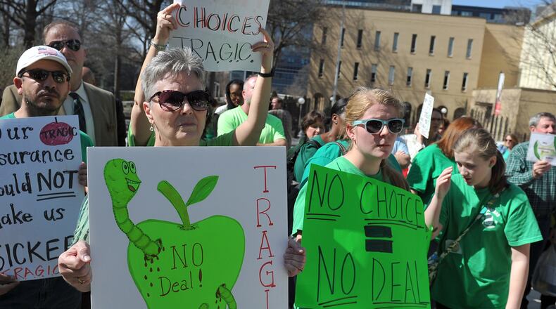News of the class-action lawsuit filed against the Georgia Department of Community Health was posted this week on the Facebook page of the 15,000-member Teachers Rally Against Georgia Insurance Changes, or TRAGIC. TRAGIC members gathered outside the State Capitol February 2014 to protest their health care insurance (above).
