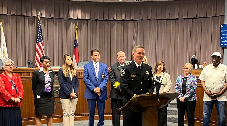 New Cobb Police Chief Stuart VanHoozer addresses the media after the Board of Commissioners voted unanimously to approve his appointment on May 10, 2022, in Marietta.