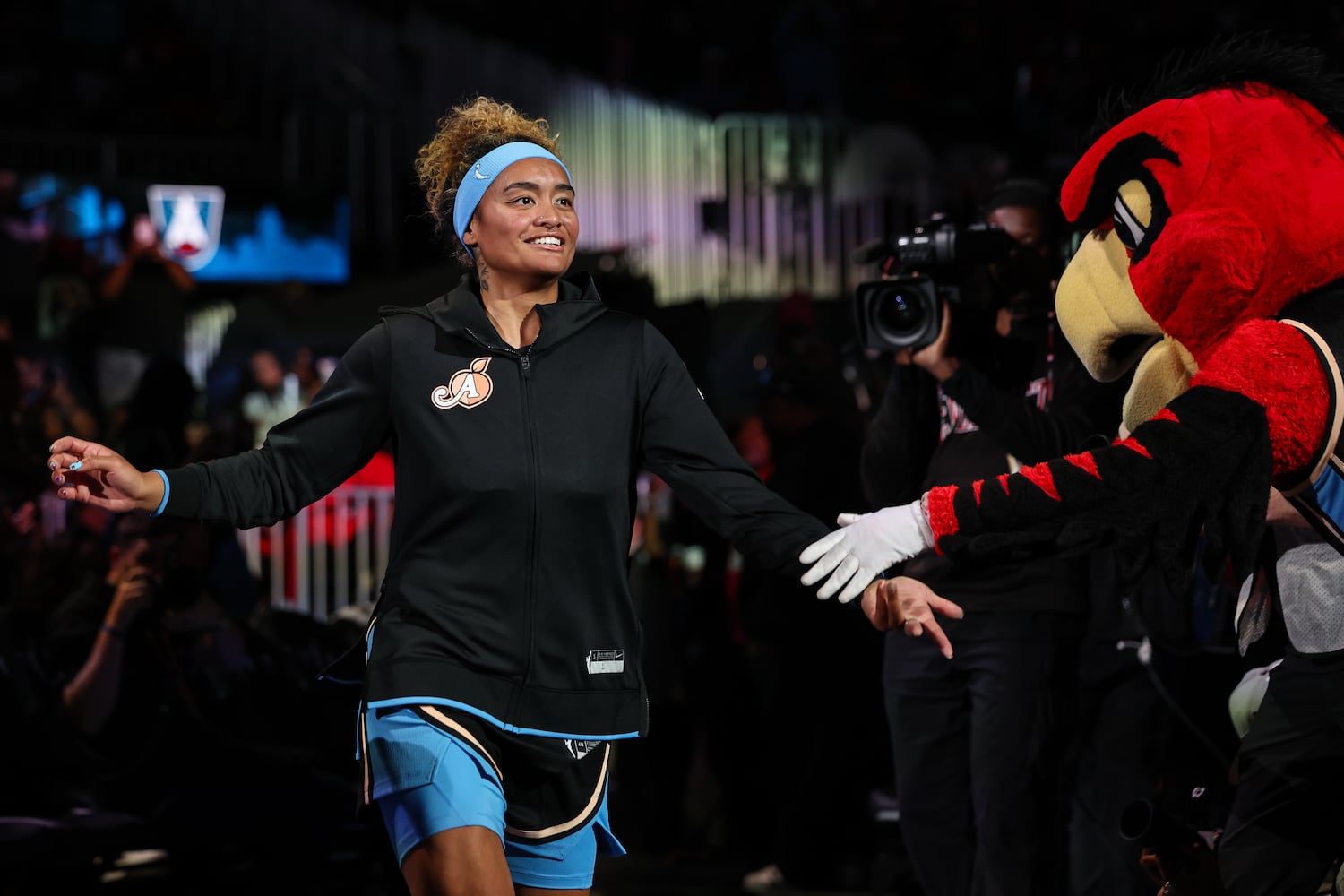 Atlanta Dream guard Te-Hina Paopao reacts during player intros before the start of a WNBA game against the Las Vegas Aces at State Farm Arena on Sunday, May 17, 2026, in Atlanta. (Colin Hubbard for the AJC) 