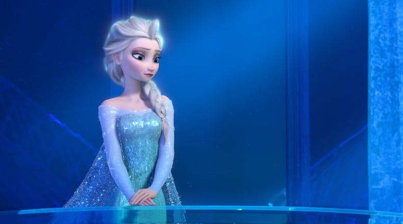 Disney shows a teenage Elsa the Snow Queen, voiced by Idina Menzel, in a scene from the animated feature “Frozen.” Although the animated film opened late in 2013, the story of Elsa, Anna, Olaf, Kristoff and Sven easily outpaced other vote-getters like “Sherlock” star Benedict Cumberbatch, TV guru Shonda Rimes, musicians Beyonce and Pharrell Williams for entertainer of the year. “Frozen” has earned Disney more than $1.27 billion at the box office worldwide, becoming the most successful animated movie of all time. (AP Photo/Disney)