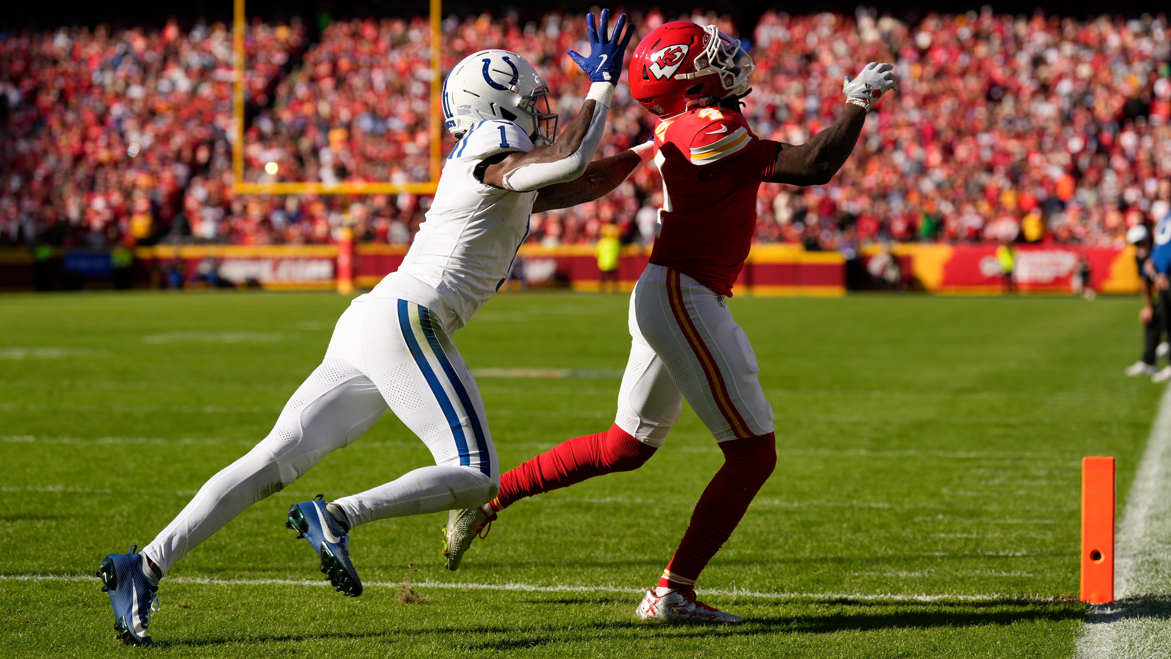 Indianapolis Colts cornerback Sauce Gardner (1) breaks up a pass to Kansas City Chiefs wide receiver Rashee Rice (4) during the first half of an NFL football game Sunday, Nov. 23, 2025, in Kansas City, Mo. (AP Photo/Charlie Riedel)