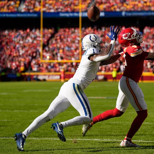 Indianapolis Colts cornerback Sauce Gardner (1) breaks up a pass to Kansas City Chiefs wide receiver Rashee Rice (4) during the first half of an NFL football game Sunday, Nov. 23, 2025, in Kansas City, Mo. (AP Photo/Charlie Riedel)