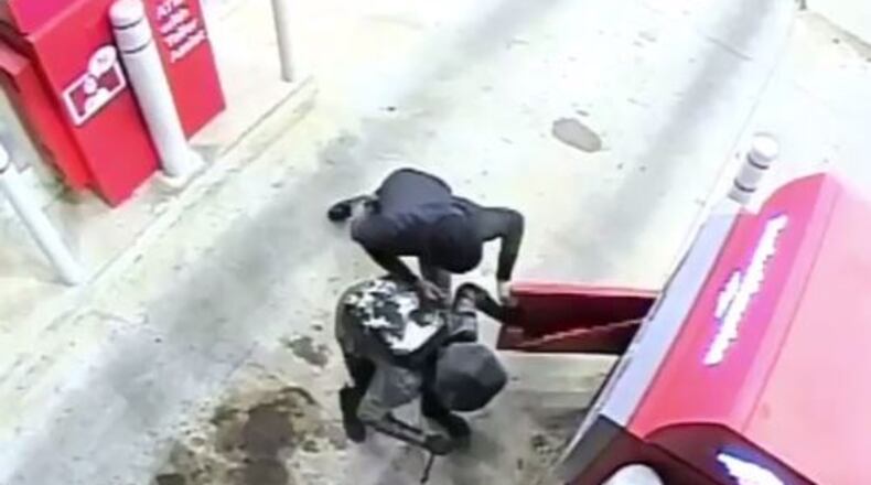 Surveillance footage captured two men attempting to break into a Bank of America ATM. (Credit: Channel 2 Action News)